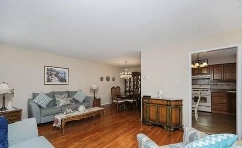 Chandelier, Dining room, Interior, Kitchen, Living room, Stainless Steel Appliances, Wood Texture Flooring