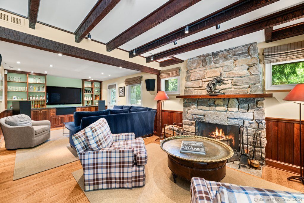 Fireplace, Interior, Living room, Recessed Lighting, Stone Walls, Wooden Beams, Wood Texture Flooring