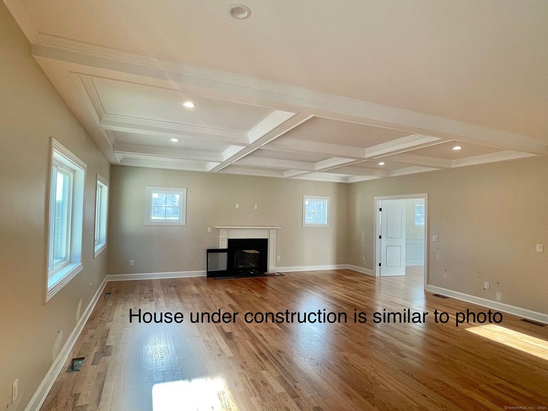 Empty room, Fireplace, Interior, Recessed Lighting, Wood Texture Flooring