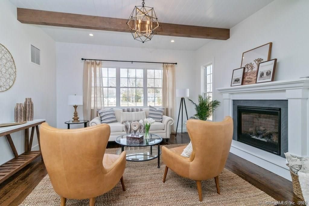 Fireplace, Interior, Living room, Pendant Lights, Recessed Lighting, Wooden Beams, Wood Texture Flooring