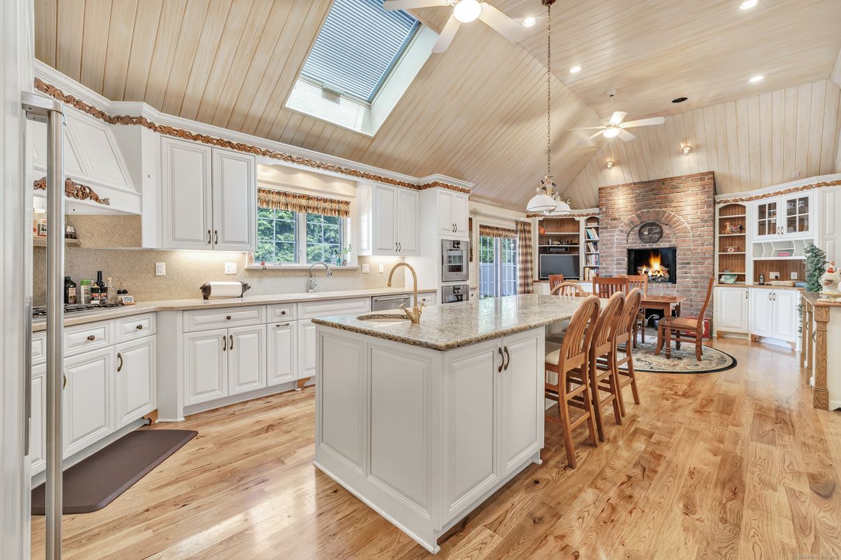 Dining room, Fireplace, Interior, Kitchen, Pendant Lights, Recessed Lighting, Stone Walls, Wood Texture Flooring
