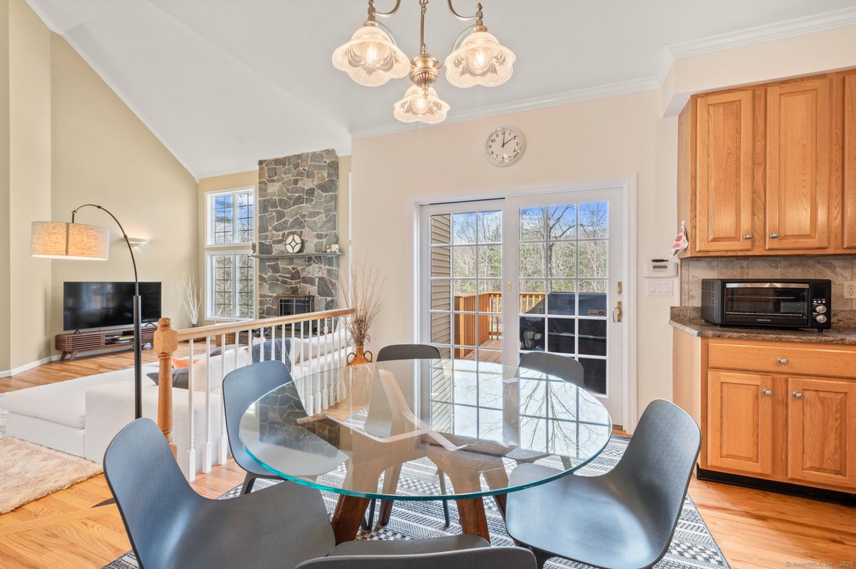 Dining room, Fireplace, Interior, Pendant Lights, Wood Texture Flooring