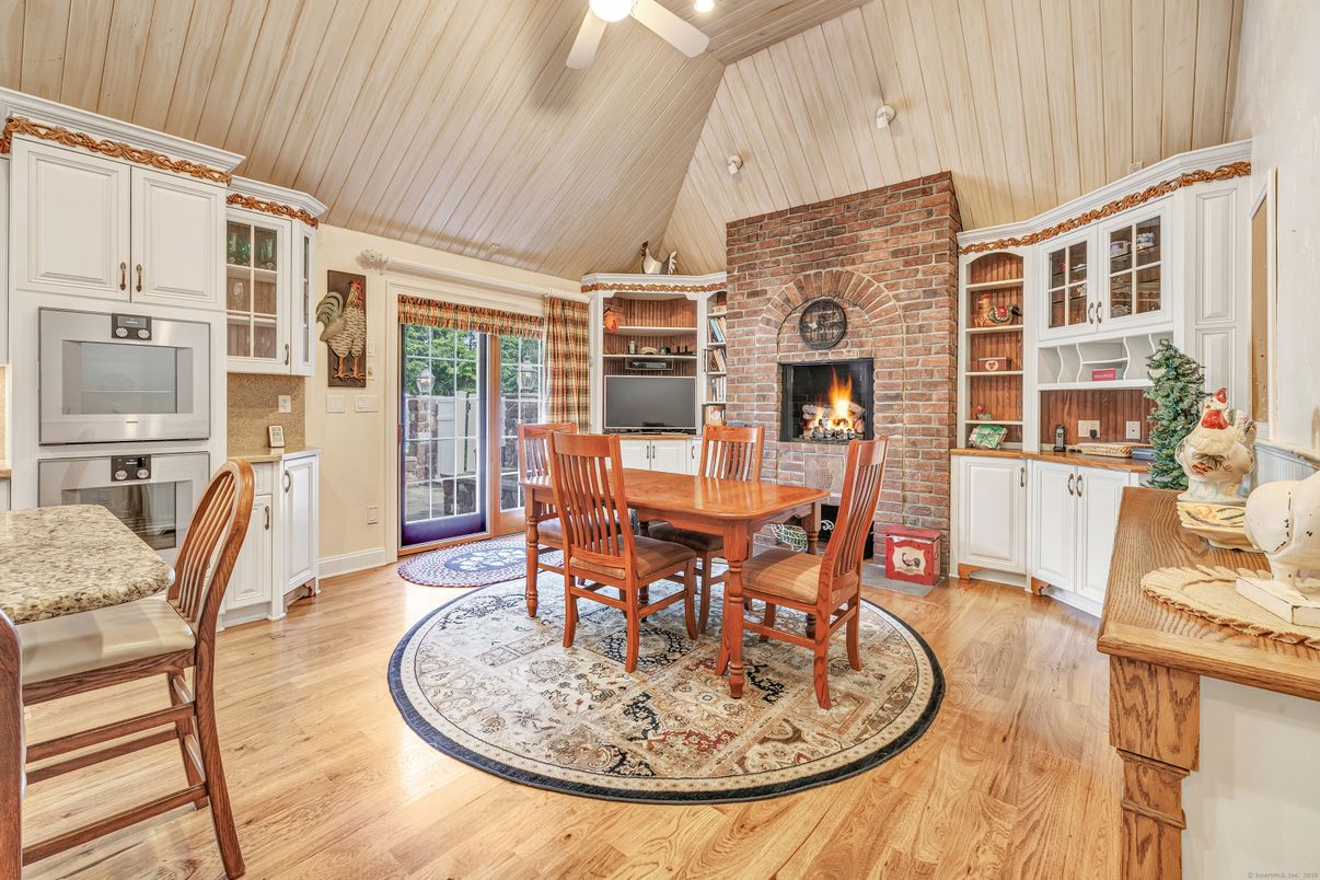 Dining room, Fireplace, Interior, Stone Walls, Wood Texture Flooring