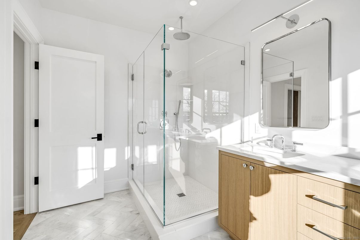Bathroom, Dual Sink Vanities, Glass Shower, Interior, Marble, Recessed Lighting