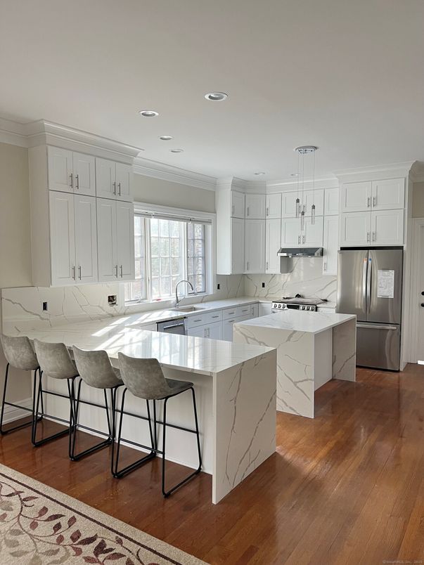 Interior, Kitchen, Pendant Lights, Recessed Lighting, Stainless Steel Appliances, Wood Texture Flooring