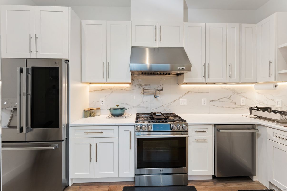 Interior, Kitchen, Marble Walls, Stainless Steel Appliances, Wood Texture Flooring