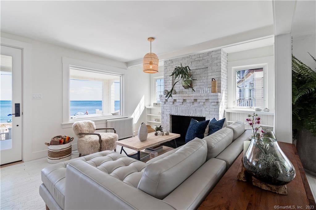 Fireplace, Interior, Living room, Pendant Lights, Stone Walls, Water, Wood Texture Flooring