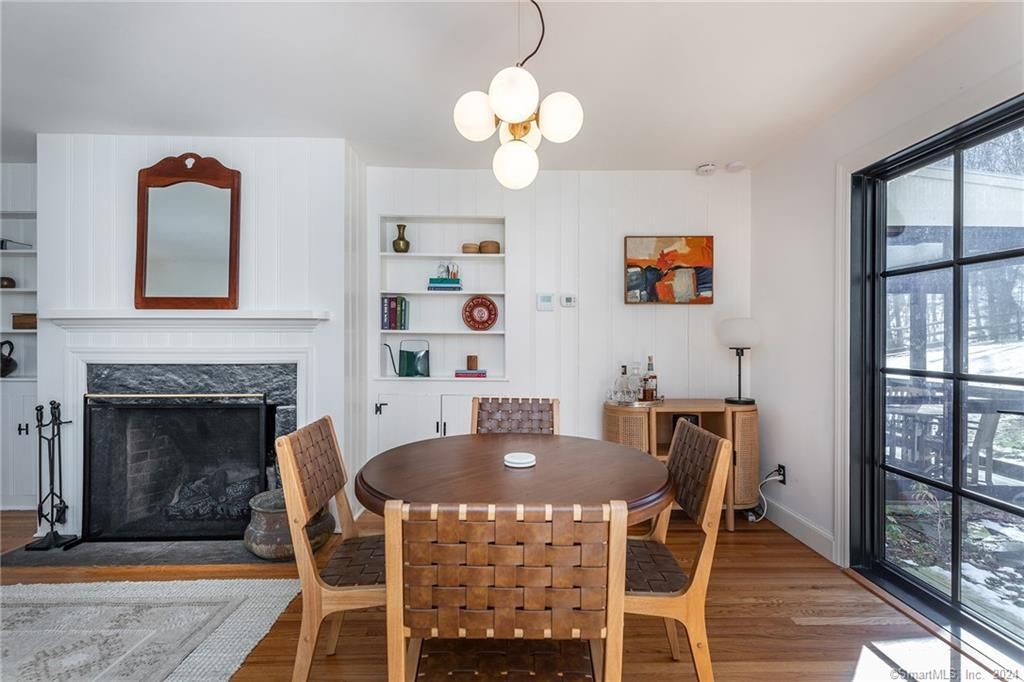 Dining room, Fireplace, Interior, Pendant Lights, Wood Texture Flooring