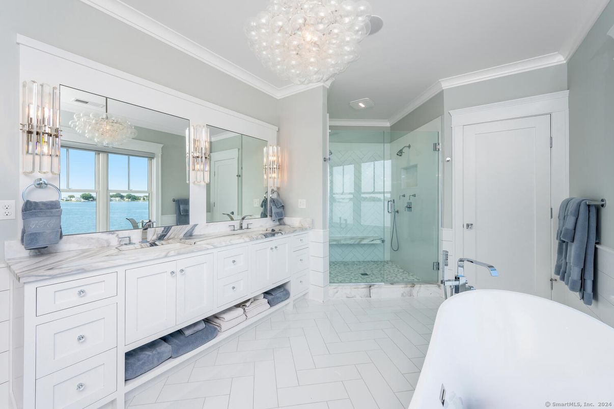 Bathroom, Chandelier, Dual Sink Vanities, Free Standing Baths, Glass Shower, Interior, Marble, Pendant Lights, Recessed Lighting