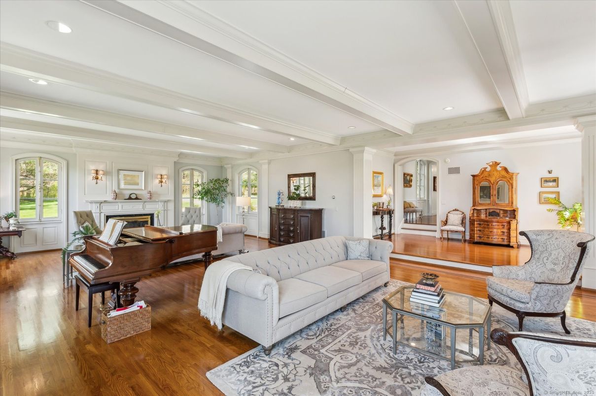 Fireplace, Interior, Living room, Piano, Recessed Lighting, Wood Texture Flooring