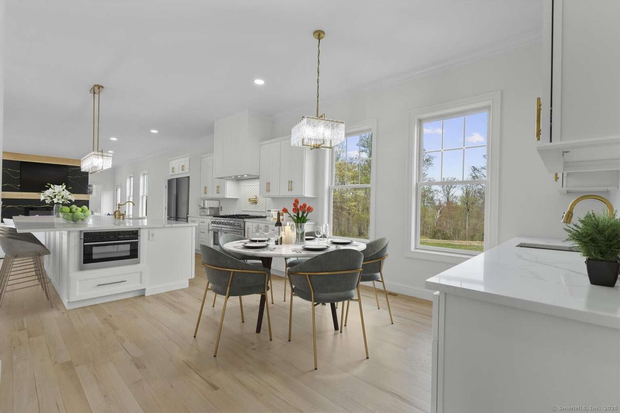 Chandelier, Dining room, Interior, Kitchen, Pendant Lights, Recessed Lighting, Stainless Steel Appliances, Wood Texture Flooring