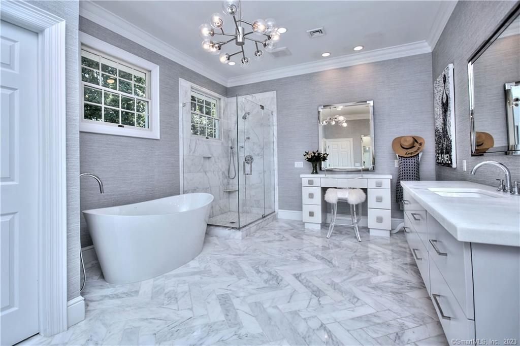 Bathroom, Dual Sink Vanities, Free Standing Baths, Glass Shower, Interior, Marble, Marble Walls, Pendant Lights, Recessed Lighting