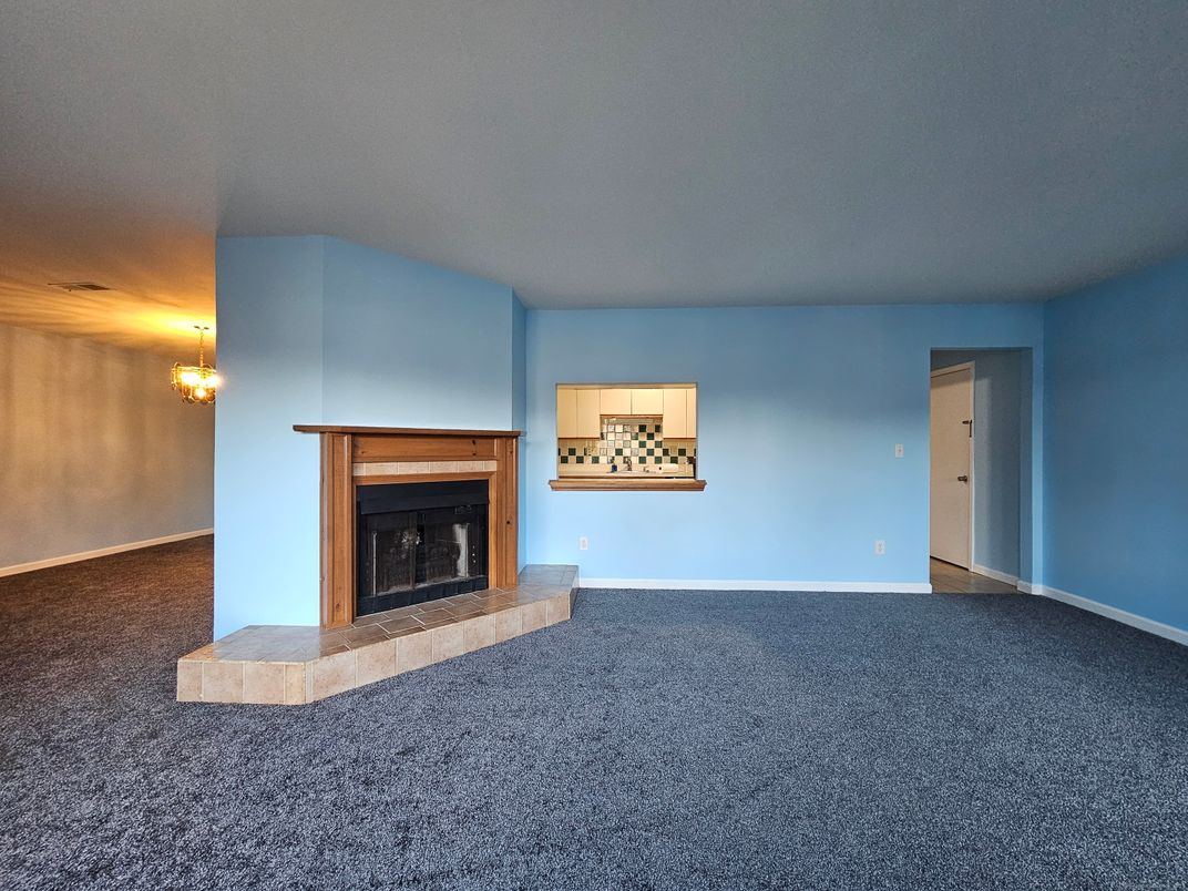 Chandelier, Empty room, Fireplace, Interior