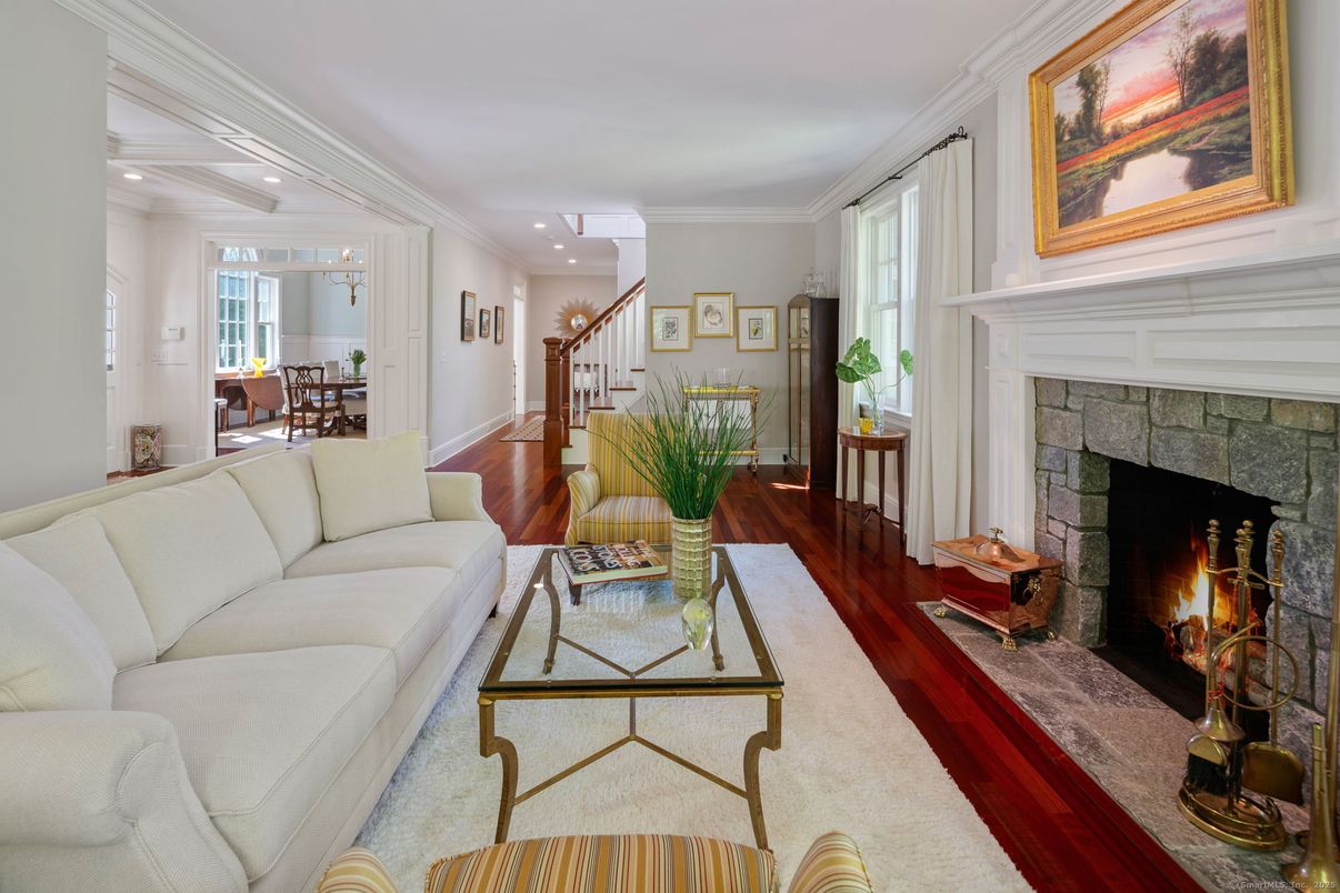 Dining room, Fireplace, Interior, Living room, Recessed Lighting, Wood Texture Flooring