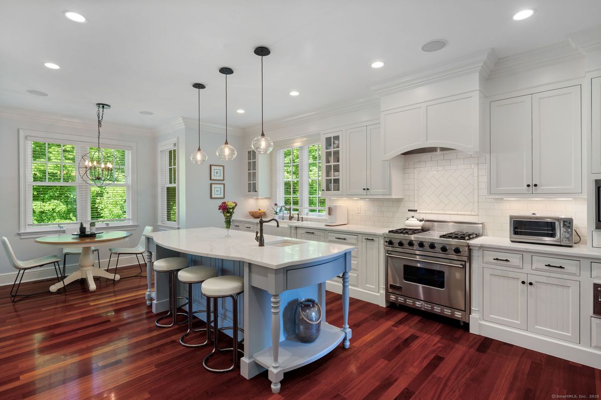 Dining room, Interior, Kitchen, Pendant Lights, Recessed Lighting, Stainless Steel Appliances, Wood Texture Flooring