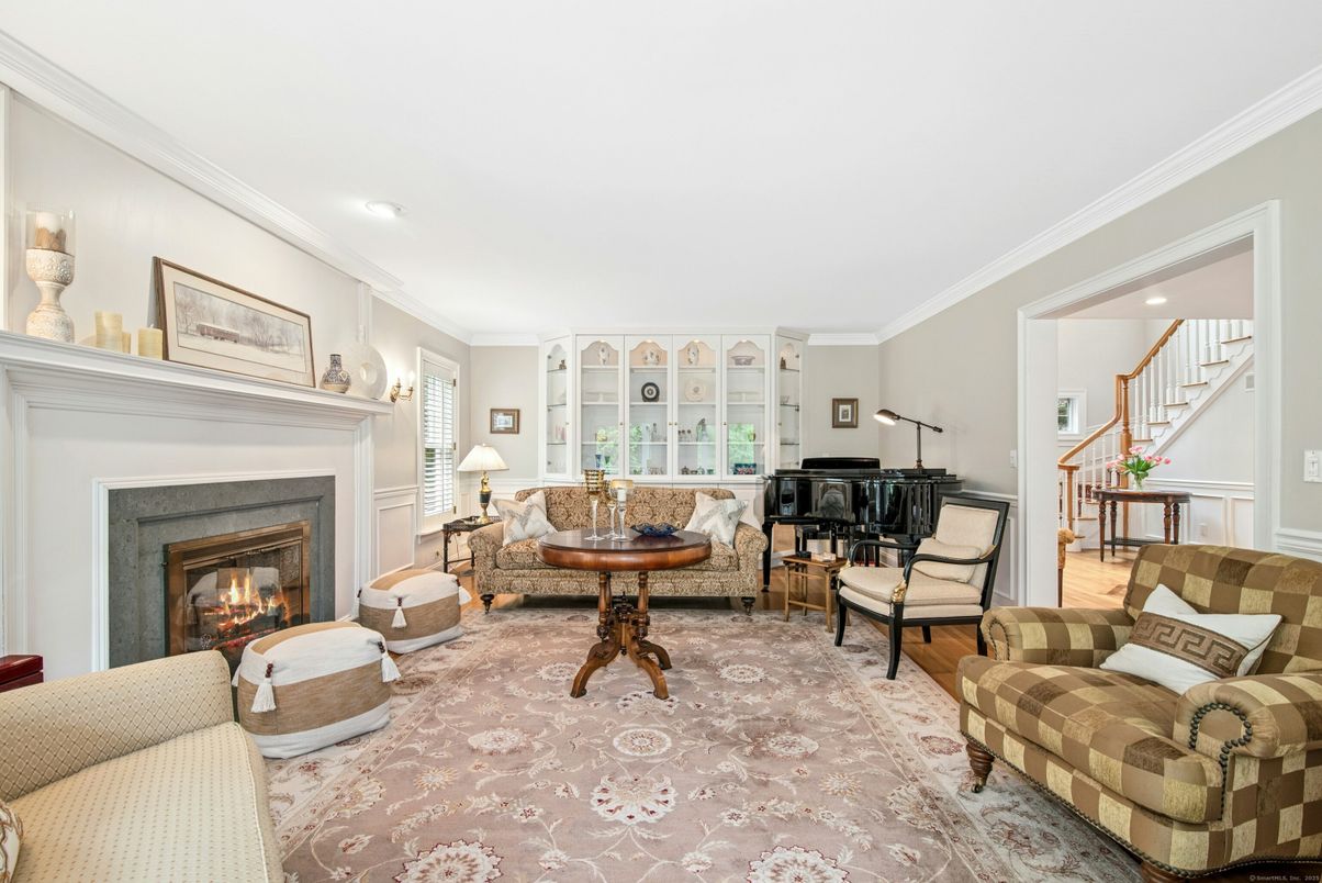 Fireplace, Interior, Living room, Piano, Recessed Lighting, Wood Texture Flooring