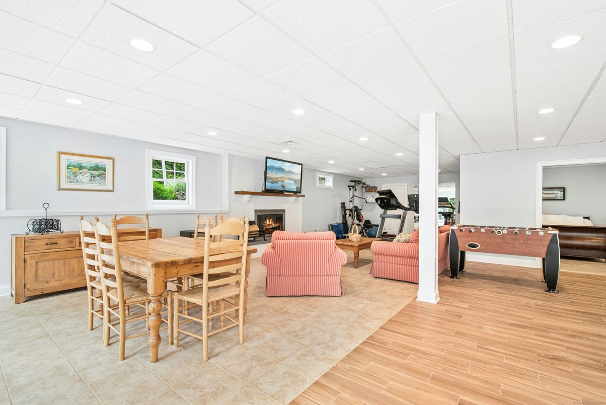 Dining room, Fireplace, Fitness Equipment, Interior, Living room, Recessed Lighting, Wood Texture Flooring