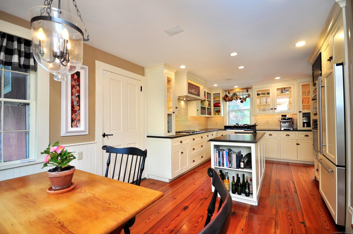 Dining room, Interior, Kitchen, Recessed Lighting, Stainless Steel Appliances, Wood Texture Flooring