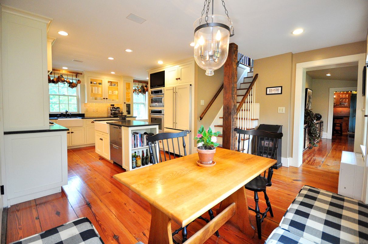 Dining room, Interior, Kitchen, Recessed Lighting, Stainless Steel Appliances, Wood Texture Flooring