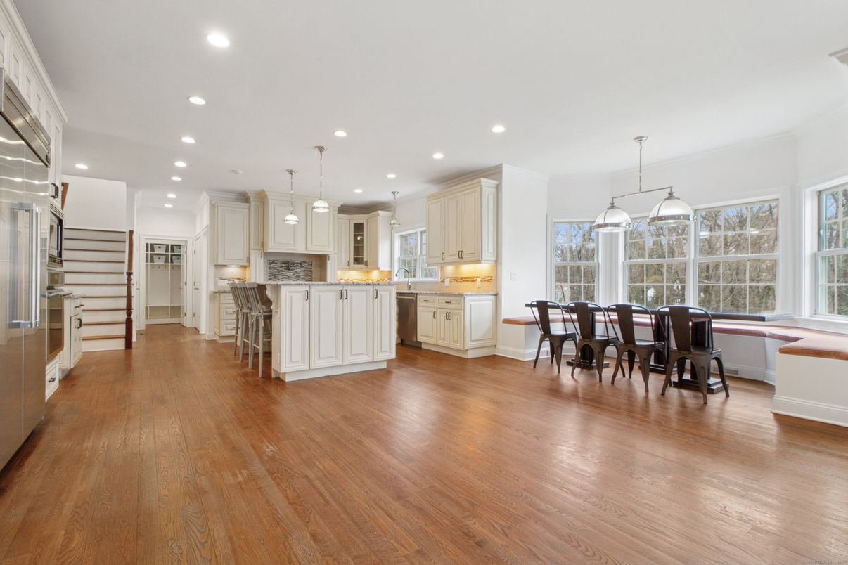 Dining room, Interior, Kitchen, Pendant Lights, Recessed Lighting, Stainless Steel Appliances, Wood Texture Flooring