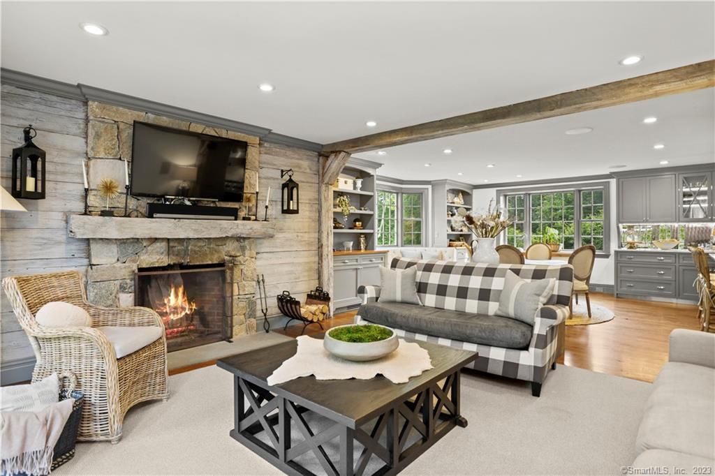 Dining room, Fireplace, Interior, Living room, Recessed Lighting, Stone Walls, Wooden Beams, Wood Texture Flooring, Wooden Walls