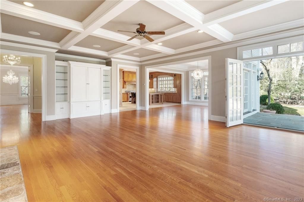 Chandelier, Empty room, Fireplace, Interior, Recessed Lighting, Wood Texture Flooring