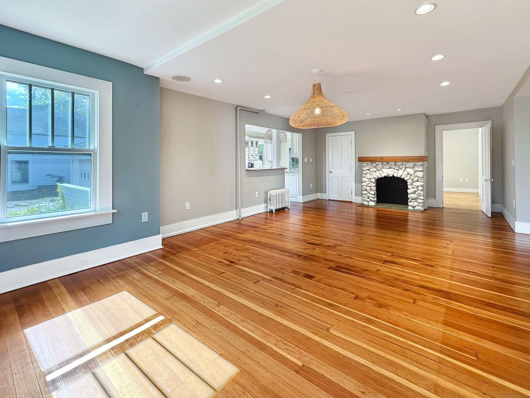 Empty room, Fireplace, Interior, Recessed Lighting, Wood Texture Flooring