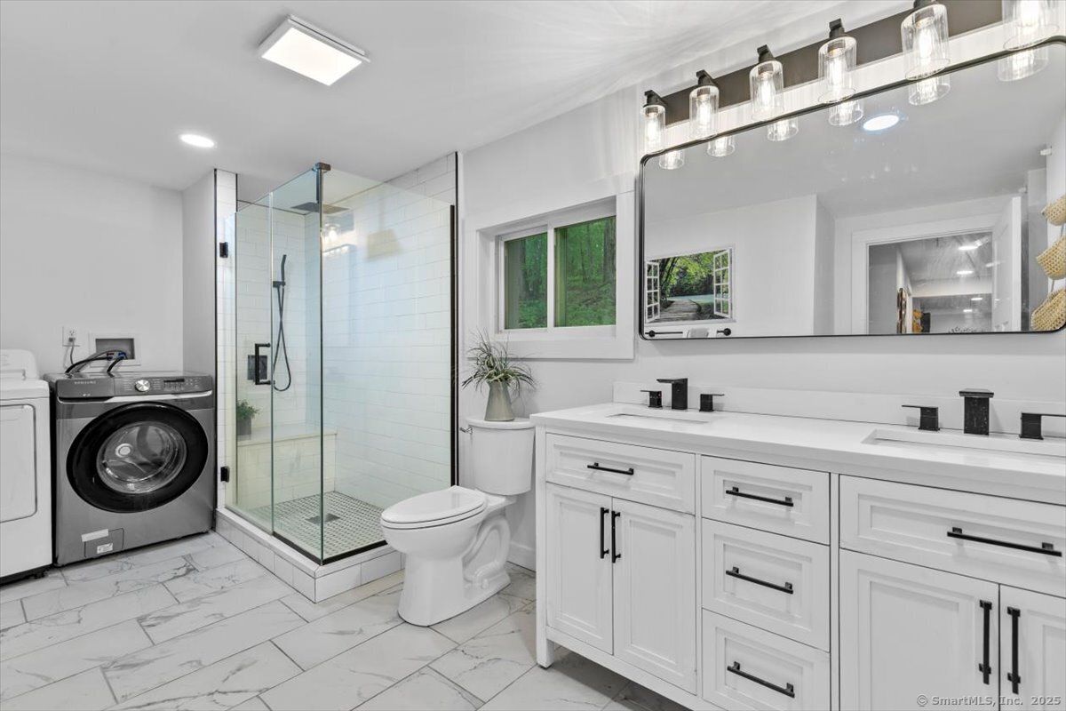 Bathroom, Dual Sink Vanities, Glass Shower, Interior, Marble, Recessed Lighting