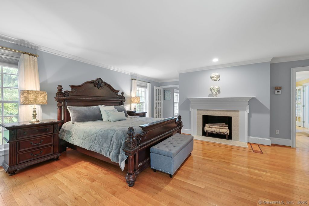 Bedroom, Fireplace, Interior, Recessed Lighting, Wood Texture Flooring