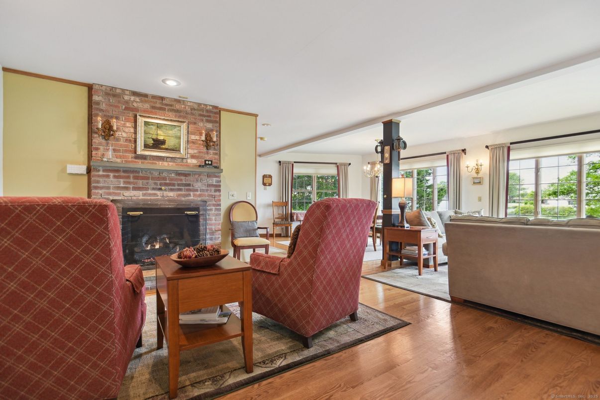 Fireplace, Interior, Living room, Recessed Lighting, Stone Walls, Wood Texture Flooring