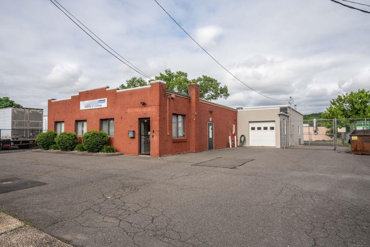 Attached, Exterior, Facade, Brick Facade, Spanish Mediterranean