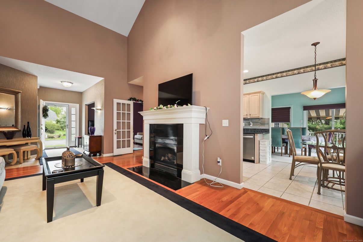 Dining room, Fireplace, Interior, Pendant Lights, Recessed Lighting, Wood Texture Flooring