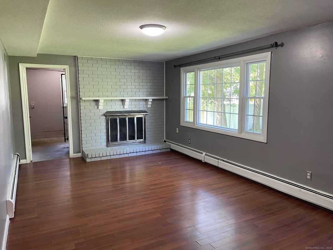 Empty room, Fireplace, Interior, Stone Walls, Wood Texture Flooring