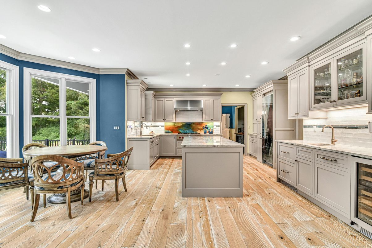 Dining room, Interior, Kitchen, Recessed Lighting, Stainless Steel Appliances, Wood Texture Flooring