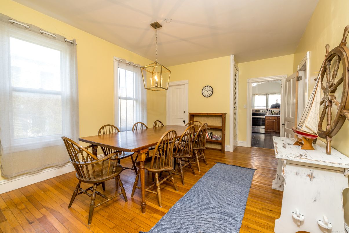 Dining room, Fireplace, Interior, Pendant Lights, Wood Texture Flooring