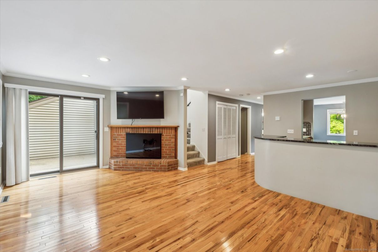 Empty room, Fireplace, Interior, Recessed Lighting, Wood Texture Flooring