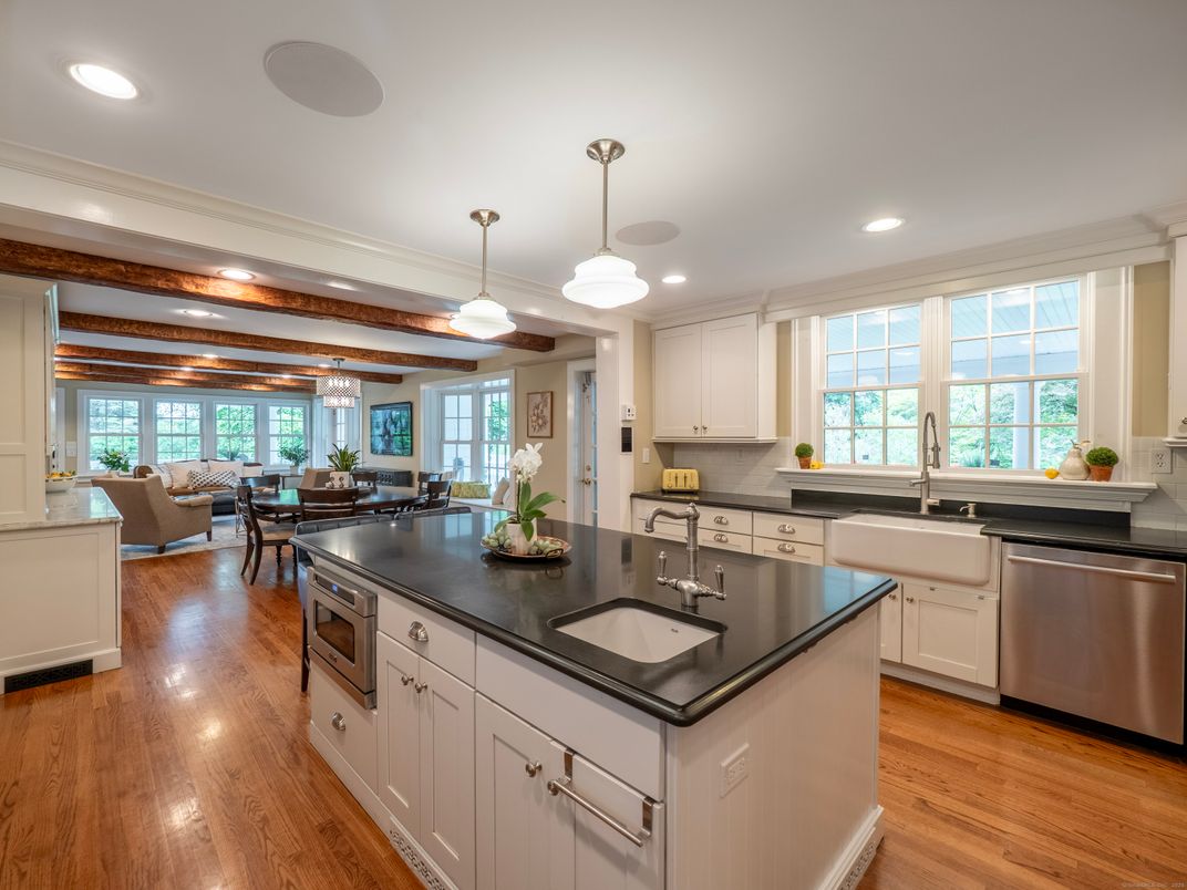 Dining room, Interior, Kitchen, Living room, Pendant Lights, Recessed Lighting, Stainless Steel Appliances, Wooden Beams, Wood Texture Flooring