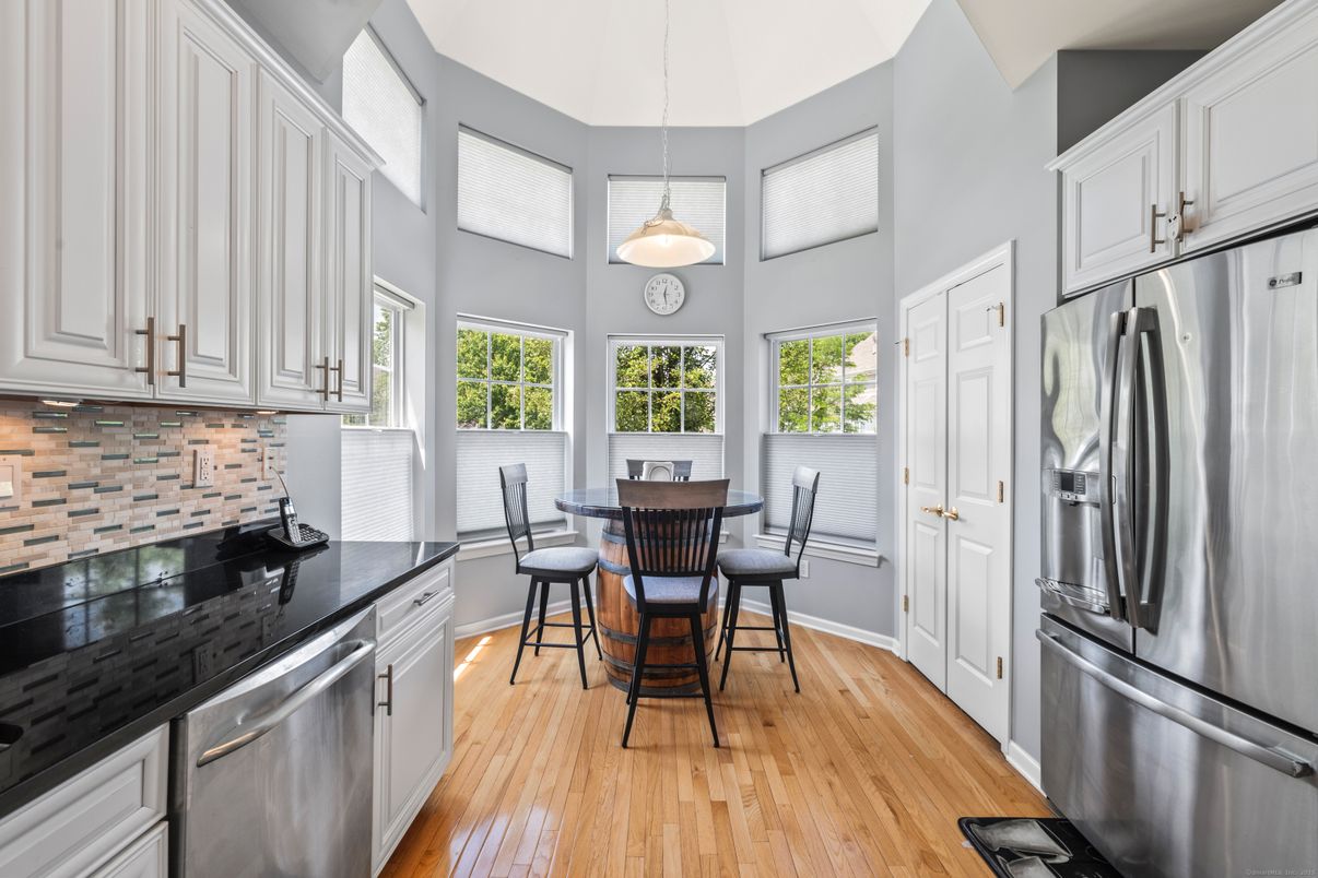 Dining room, Interior, Kitchen, Pendant Lights, Stainless Steel Appliances, Wood Texture Flooring