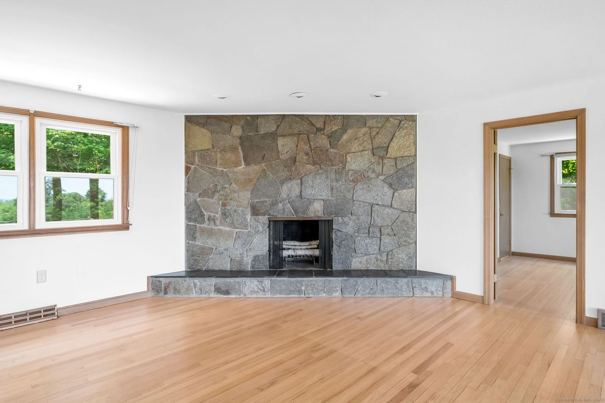 Empty room, Fireplace, Interior, Stone Walls, Wood Texture Flooring