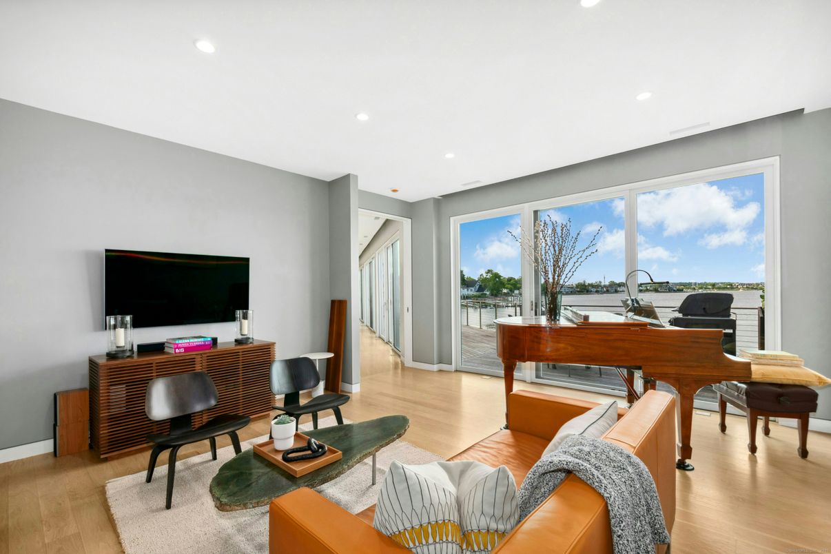 Interior, Living room, Piano, Recessed Lighting, Water, Wood Texture Flooring