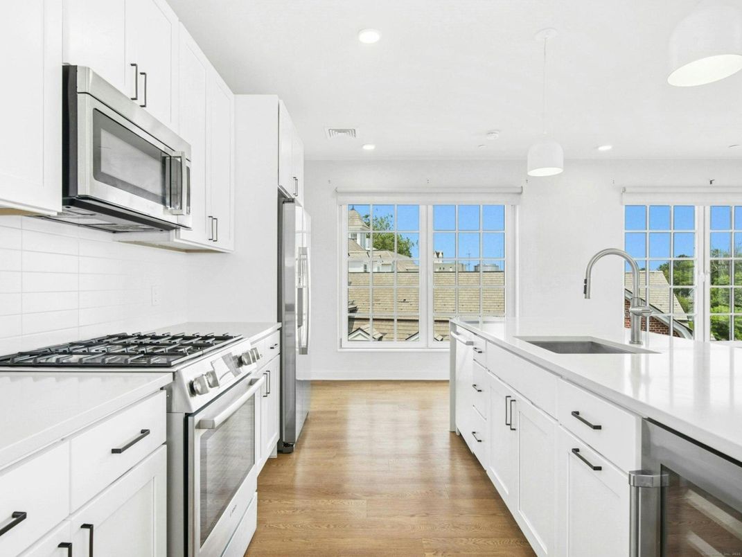 Interior, Kitchen, Pendant Lights, Recessed Lighting, Stainless Steel Appliances, Water, Wood Texture Flooring