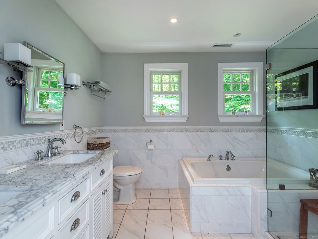 Bathroom, Dual Sink Vanities, Interior, Marble, Marble Walls, Recessed Lighting