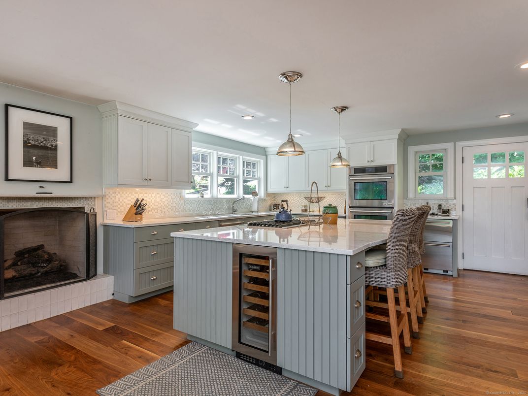 Fireplace, Interior, Kitchen, Pendant Lights, Recessed Lighting, Stainless Steel Appliances, Wood Texture Flooring