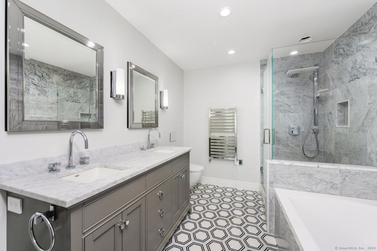 Bathroom, Dual Sink Vanities, Glass Shower, Interior, Marble Walls, Recessed Lighting