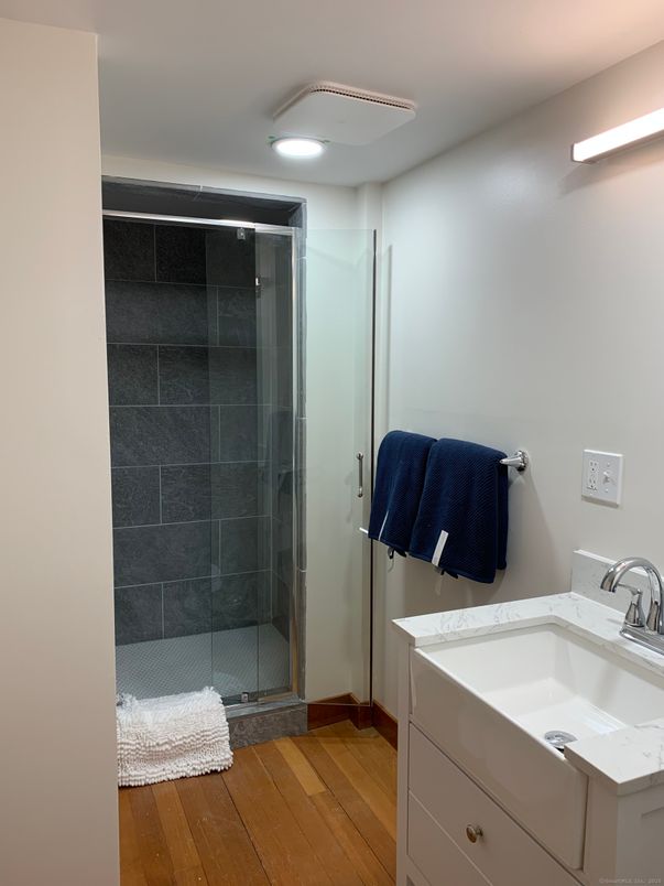Bathroom, Glass Shower, Interior, Recessed Lighting, Wood Texture Flooring