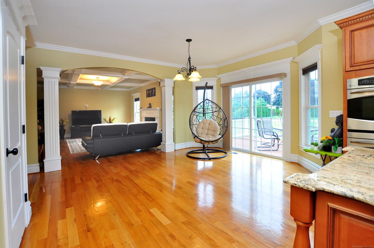 Fireplace, Interior, Kitchen, Living room, Pendant Lights, Stainless Steel Appliances, Wood Texture Flooring