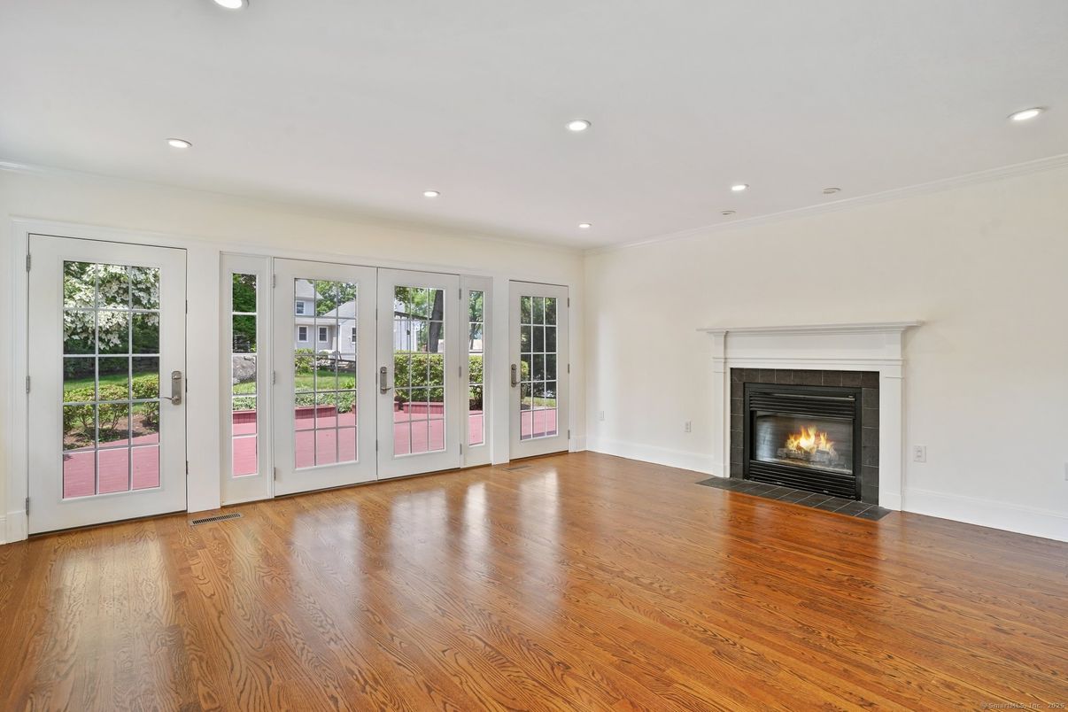 Empty room, Fireplace, Interior, Recessed Lighting, Wood Texture Flooring