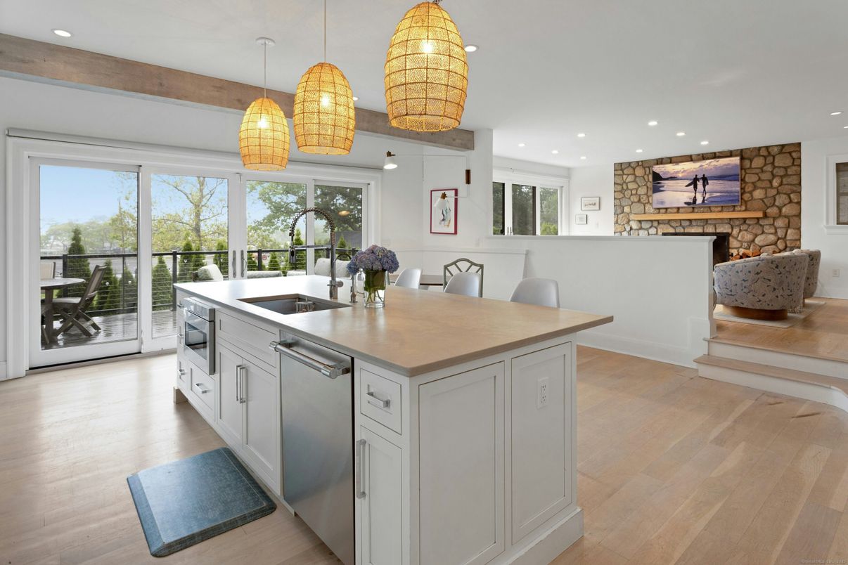 Dining room, Fireplace, Interior, Kitchen, Pendant Lights, Recessed Lighting, Stone Walls, Wood Texture Flooring