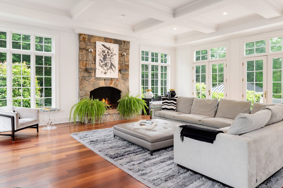 Fireplace, Interior, Living room, Recessed Lighting, Stone Walls, Wood Texture Flooring
