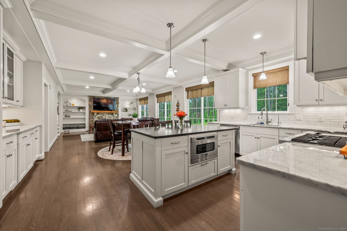 Dining room, Interior, Kitchen, Pendant Lights, Recessed Lighting, Stainless Steel Appliances, Wood Texture Flooring